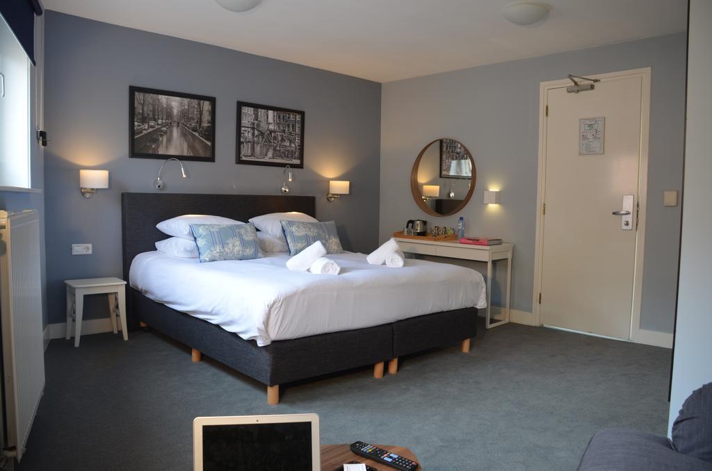Frisco Inn Ámsterdam Habitación foto