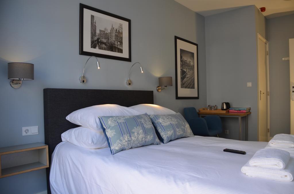 Frisco Inn Ámsterdam Habitación foto